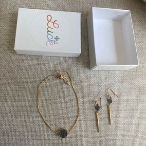 Never worn before gold bracelet and earrings set